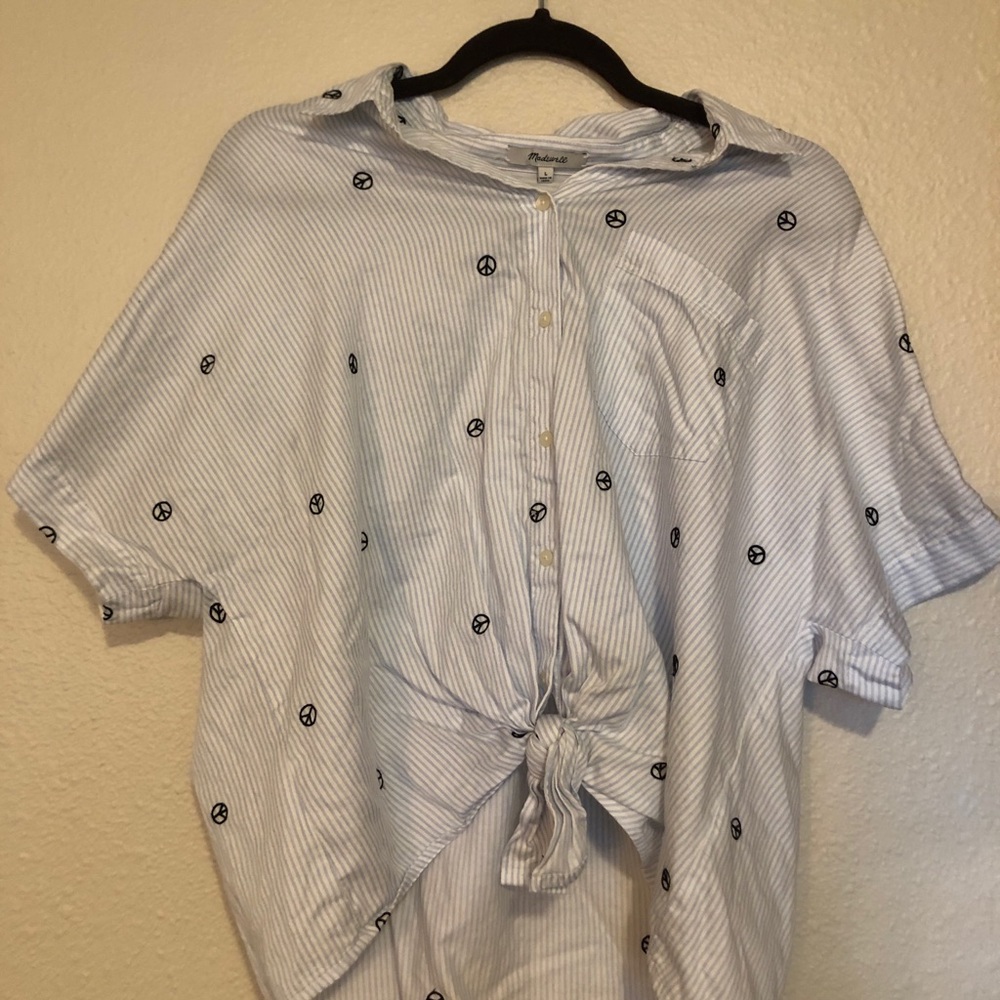 Peace design + striped shirt.